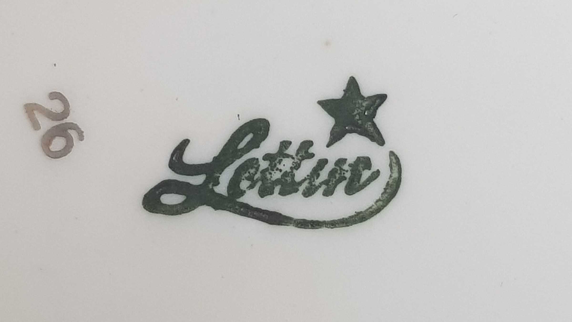 Firmenmarke Lettin Firmenmarke Lettin mit geschwungenem Schriftzug und Stern auf dem i